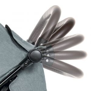 Родительская ручка регулируется по высоте, покрыта эко-кожей