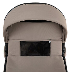 Ветрозащитный бортик накидки крепится магнитами и имеет прозрачное окошко