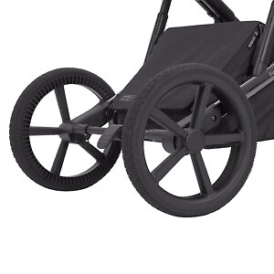 Большие задние колеса с рычажной амортизацией и удобная педаль тормоза