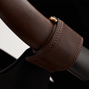 Два ремешка из кожи для фиксации на ручке любой коляски